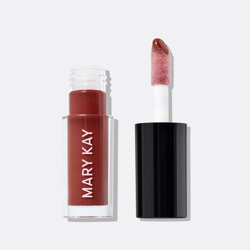 Uncapped Mary Kay Tinted Lip Oil in Berry against white background