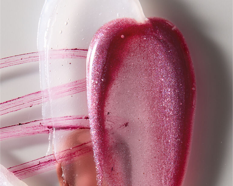 Collage of stacked product swipes featuring lip gloss, lip balm and lip liner