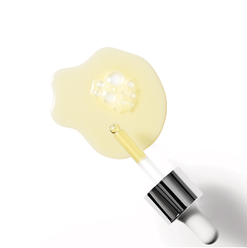 Texture rub of serum and dropper against white background